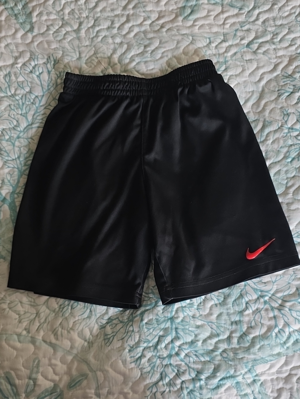 Nike (7) Black Shorts with Red Swoosh Logo